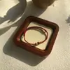Pulsera de Madera de Durazno y Cinabrio del Monte Putuo con Hilo Rojo, Cuerda Tejida para Niños y Bebés, Tobillera y Pulsera Amuleto Anti-Susto para Bebés