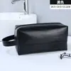 Neceser de mano portátil de alta gama transfronterizo de gran capacidad, bolsa de almacenamiento de cosméticos de viaje impermeable de PU