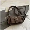 Bolsa de Motocicleta de Bolsillo Retro de Nicho Nueva Primavera/Verano 2026 Bolso de Hombro Cruzado de Gran Capacidad de Moda para Viajeros de Negocios de Alta Gama