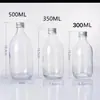 Atacado Garrafa Transparente para Bebidas Chá de Leite Café Selada com Tampa 350ml Garrafa de Vidro Transparente para Água Salgada Garrafa de Vidro para Enzimas