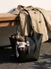 Bolso cruzado para mujer 2026 Diseño de nicho Bolso de axila francés Bolso de mano de alta gama Bolso de hombro retro a la moda para el trabajo