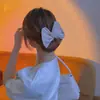 Moda de celebridad de internet banda giratoria para el cabello femenina moño de moño de pelo de moño perezoso clip de torsión mágica rizador de pelo perezoso al por mayor