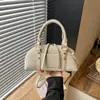 Bolso transfronterizo para uso diario, nuevo bolso versátil y exquisito 2026, bolso de hombro y cruzado de moda y súper popular para el trabajo