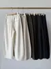 Pantalones de lana y acetato de pierna curva - adelgazantes, de cintura alta, casuales y con un diseño deconstruido