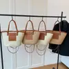 Fornecido diretamente pelo fabricante, bolsa de ombro feminina, bolsa tecida artesanal vintage europeia e americana, bolsa de palha, bolsa de mão casual estilo férias para mulheres