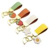 Llavero con patrón de cabra francés exquisito llavero de piel de cordero para llave de coche flor fruta colgante de alta gama regalo para pareja