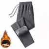 Calça de moletom grossa e quente com forro de fleece para homens, estilo solto de perna reta, nova calça casual outono/inverno para homens