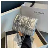 Bolso de cadena acolchado estilo Chanel para mujer, nuevo bolso cruzado mini de moda versátil 2026, bolso cuadrado pequeño popular