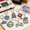 Llavero de Metal para Consola de Videojuegos Retro Transfronteriza Estilo Pixelado de Dibujos Animados Tetris de Mano Colgante Nostálgico Hecho a Medida