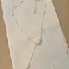 Collar de perlas con colgante minimalista de gota de agua, cadena para la clavícula de moda de lujo ligero y de alta gama, collar elegante suave y versátil para mujer