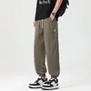 Ropa para Hombre Xintang Dropshipping Verano 2026 Nuevos Pantalones Casuales de Tencel para Hombre Delgados Holgados Pantalones Jogger