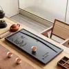 Nova bandeja de chá, feita de pedra sintética preta, design integrado, semelhante a uma peça inteira de pedra natural, adequada para uso doméstico e de escritório, estilo moderno e minimalista, com sistema de drenagem direta