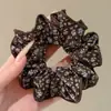 Goma para el pelo floral para mujer, nuevo modelo 2026, accesorio de alta gama para moño, accesorio para el cabello estilo coreano