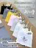 Nuevo top tipo camiseta de tirantes de dibujos animados de dopamina con almohadillas en el pecho, versátil, adelgazante, para usar en capas o solo, hermoso top de espalda para mujer
