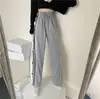 Outono 2024 Novos Calças Casuais de Perna Larga Femininas Estilo Coreano Botão Solto Design de Estudante Calças Retas Split