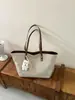 Bolso de Hombro Grande Capacidad Retro para Mujer 2026 Nuevo Bolso de Hombro Único Tacto de Alta Gama para el Trabajo Viajes Salida Bolso Tote