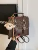 Bolsa Retro Mate Moda Femenina Versátil Mochila de Estudiante Otoño 2025 Nueva Tendencia Callejera Ligera Mochila de Viaje