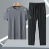8307-2 Verano Hombres Seda de Hielo Transpirable que Absorbe la Humedad Conjunto de Pantalones Largos Casual Deportivo Cuello Redondo Moda de Alta Calidad Secado Rápido