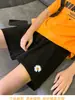Pantalones cortos deportivos de verano para mujer, negros, pantalones largos de tres cuartos finos de cintura alta, nuevo modelo 2026, pantalones casuales holgados y anti-exposición