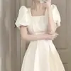 Verão 2024 Novo Francês Primeiro Amor Vestido Longo Branco Feminino Emagrecedor Pequeno Fresco Elegante Vestido de Manga Curta Transfronteiriço
