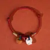Pulsera de Hilo Rojo con Huesos de Durazno para la Buena Suerte en el Año Zodiacal de Uno, Adecuada para Hombres, Mujeres, Bebés y Niños, Tejida para Protección Contra el Miedo, Hecha de Madera de Durazno Vieja