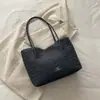 Bolso tote tejido nuevo 2026, bolso de hombro de gran capacidad, bolso de mano simple y casual estilo coreano, bolso de paja para mujer para el trabajo