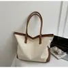Bolsa tote de gran capacidad, bolsa de lona para mujer, adecuada para el trabajo y los desplazamientos, elegante y con estilo, color liso estilo coreano, bolso de hombro versátil para mujer