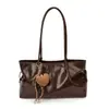 2026 Nova Bolsa de Axila Retro Simples Versátil Outono Feminina Grande Capacidade Manual para Deslocamento Bolsa Tote de Ombro Único