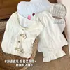 Xiaohongshu y Douyin: Nueva colección Otoño/Invierno de conjuntos de pijama de algodón nube a cuadros para mujer con copas incorporadas, adecuados para ventas transfronterizas