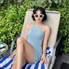 Traje de baño de una pieza estilo falda de nuevo diseño 2026 para mujer, que oculta el abdomen y estiliza, adecuado para vacaciones en la playa y aguas termales [Disponible para Dropshipping]