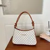 Bolsa Nueva de Verano 2026 en Forma de Media Luna Versátil Bolso de Hombro para Mujer Bolso Cruzado Textura de Moda Bolso para Viajes de Negocios y Salidas Transfronterizas