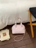 Bolso de Mano Transfronterizo Simple de Gran Capacidad para Mujer 2026 Nueva Moda Bolso de Concha de Gama Alta Bolso Cruzado de Hombro para Viajes