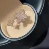 Anel Flor de Quatro Folhas Cravejado com Diamantes Brilhantes Novo Estilo Venda por Atacado Design de Nicho Luxo Leve High-End Ajustável Anel Aberto para Mulheres