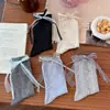 Calcetines con lazo de cinta de encaje para mujer, calcetines dulces de encaje hasta la mitad de la pantorrilla, calcetines de malla con lunares y volantes de gato de dibujos animados japoneses, calcetines jk