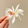 Pinza para el pelo floral, pinza lateral ultra-hada para mujer, nuevo accesorio para el pelo de flor artificial de alta gama 2026, adorno para el pelo de playa