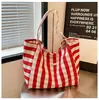 Bolsa de Lona Grande Capacidade para Mulheres 2026 Nova Nicho Estilo Ins Bolsa Tote para Trabalho e Dia a Dia Bolsa de Ombro Casual Estilo Coreano