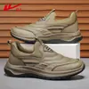 Sapatos Esportivos Masculinos HuiLi 2026 Novo Estilo Superfície de Couro Sapatos Casuais para Caminhada Antiderrapante Slip-on Sapatos para Pai