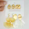 Nuevo Juego de Pendientes de Estilo Europeo y Americano con Rayas Trenzadas, Diseño Retro Geométrico, Sensación Simple y de Alta Gama, Juego de Pendientes de Botón de Nueve Piezas para Mujer