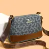 Bolsa de Mão Versátil Estilosa Moda Retrô para Mulheres 2026 Novo Modelo Simples Casual de Alta Qualidade Bolsa de Ombro Transversal para o Dia a Dia
