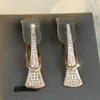 Venda Quente Europeia e Americana Rodada Irregular Diamante Branco Super Brilhante Salto Alto Design Argola de Orelha Personalidade de Alto Padrão Brilho Leve Brincos
