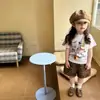Camisetas para niños y niñas ropa de verano 2026 nuevo moderno genial moda estampado de grafiti popular manga corta pantalones cortos conjunto de dos piezas
