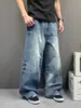 Silueta urbana casual, efecto de bigote lavado, jeans de corte curvo holgados, nuevos pantalones anchos relajados estilo americano para hombre y mujer