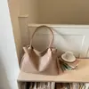 Bolsa de gran capacidad para el trabajo para mujer, nuevo modelo 2026, bolso tote de cuero tejido de alta gama, bolso de hombro de moda para el trabajo