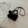 Bolso de diseño único para mujer, colección otoño 2026, bolso de hombro minimalista y relajado estilo coreano, bolso cruzado de color liso a la moda