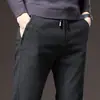En nombre de ruffian guapo al por mayor pantalones casuales de otoño e invierno nuevos pantalones sueltos para hombre tubo recto pantalones de negocios de alta gama para jóvenes