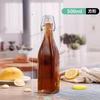 Garrafa de vidro transparente de 236 ml (8 oz) com encaixe de pressão para bebidas, ideal para vinho caseiro, sucos, enzimas e cerveja. Garrafa com fivela para cerveja.