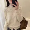 Cardigan de punto hueco de estilo moderno y sencillo con cuello semi-alto, nuevo suéter de ganchillo de color liso para mujer otoño 2026