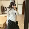 Top básico liso popular, novidade de outono, gola redonda, elegante, caimento justo, versátil, camiseta de manga comprida super modeladora 2026