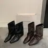 Botas de mujer de cuero suave con hebilla retro estilo páramo 2026 nuevo modelo punta fina botas cortas elegantes botas de montar a media pantorrilla de moda