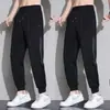 Calças Casuais de Seda Gelo Masculinas 2025 Verão Finas de Secagem Rápida Esportivas Soltas Ajustadas no Tornozelo Calças Harem Cropped de Marca na Moda